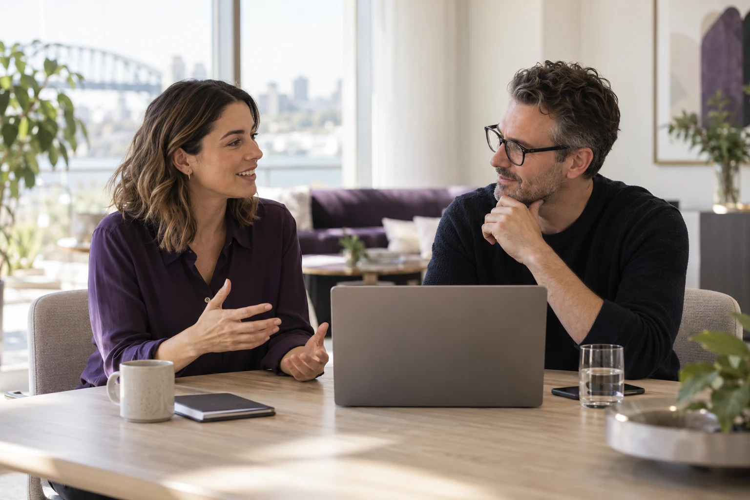 Two professionals discussing a recruitment brief together